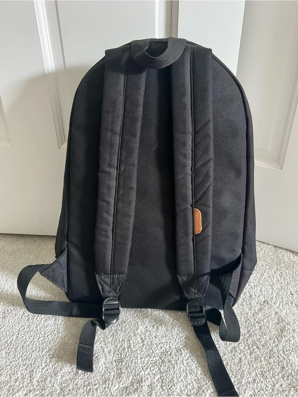 Herschel Black Backpack with Yellow Cord